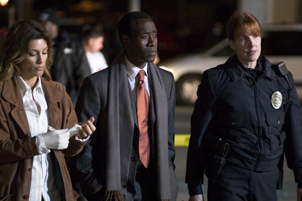 Jennifer Esposito (Left) and Don Cheadle (Center) in Crash