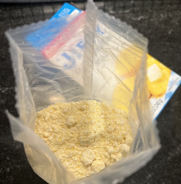 Inside the box of JIFFY Corn Muffin Mix