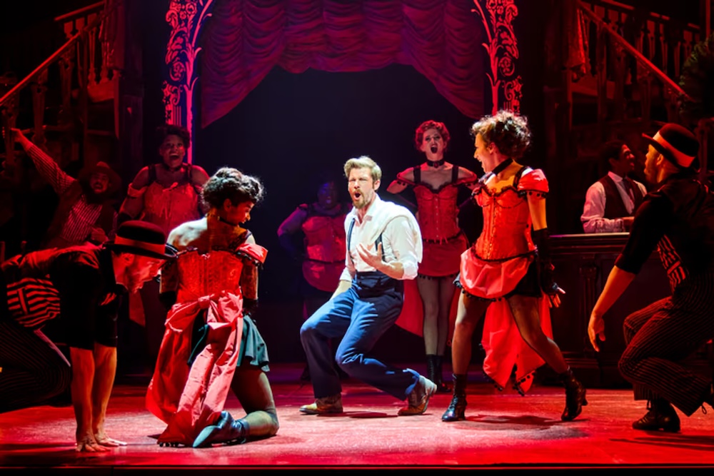Hunter Parrish (center) as Jesse Whitewater in Gun & Powder at Paper Mill Playhouse.
( © Jeremy Daniel)